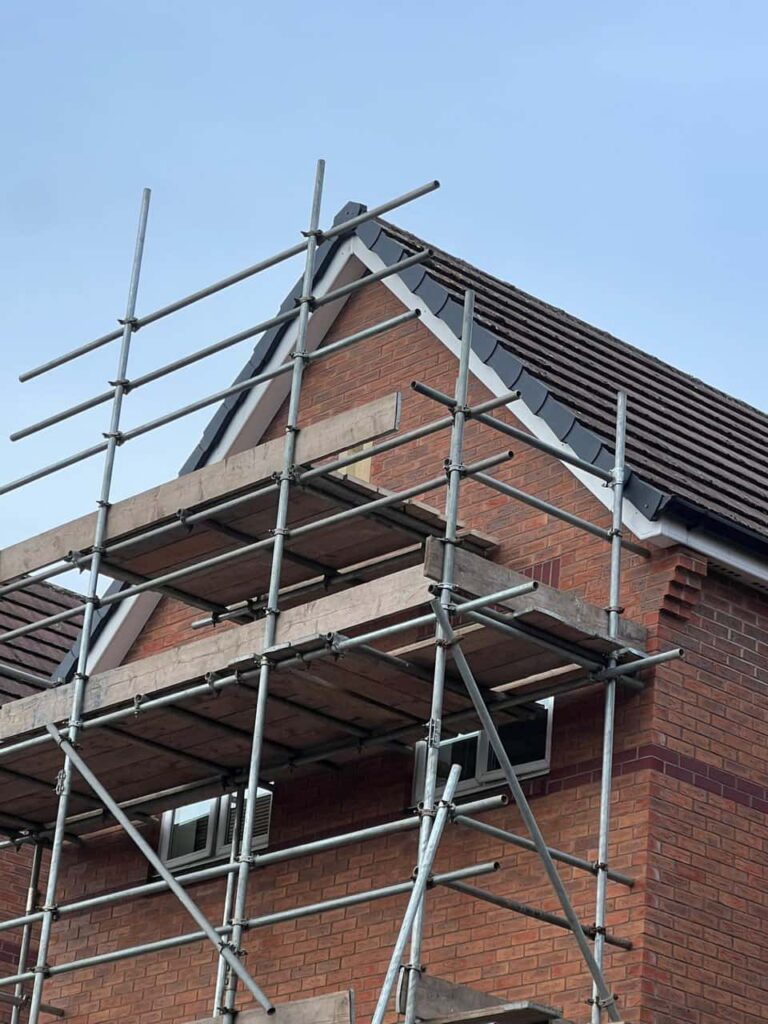 This is a photo of a roof which has just been repaired. There is a scaffold located at the gable end for access onto the roof. Works carried out by TRP Roofing Sutton-on-Hull